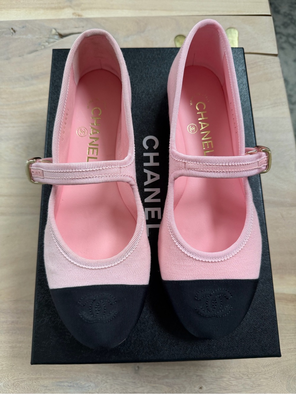 CHANEL Pink Canvas Mary Jane Flats with Black Cap Toes and Gold Buckles